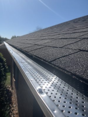 roof-of-a-house-showing-gutter-and-gutter-guard-pr-2024-11-27-05-54-44-utc