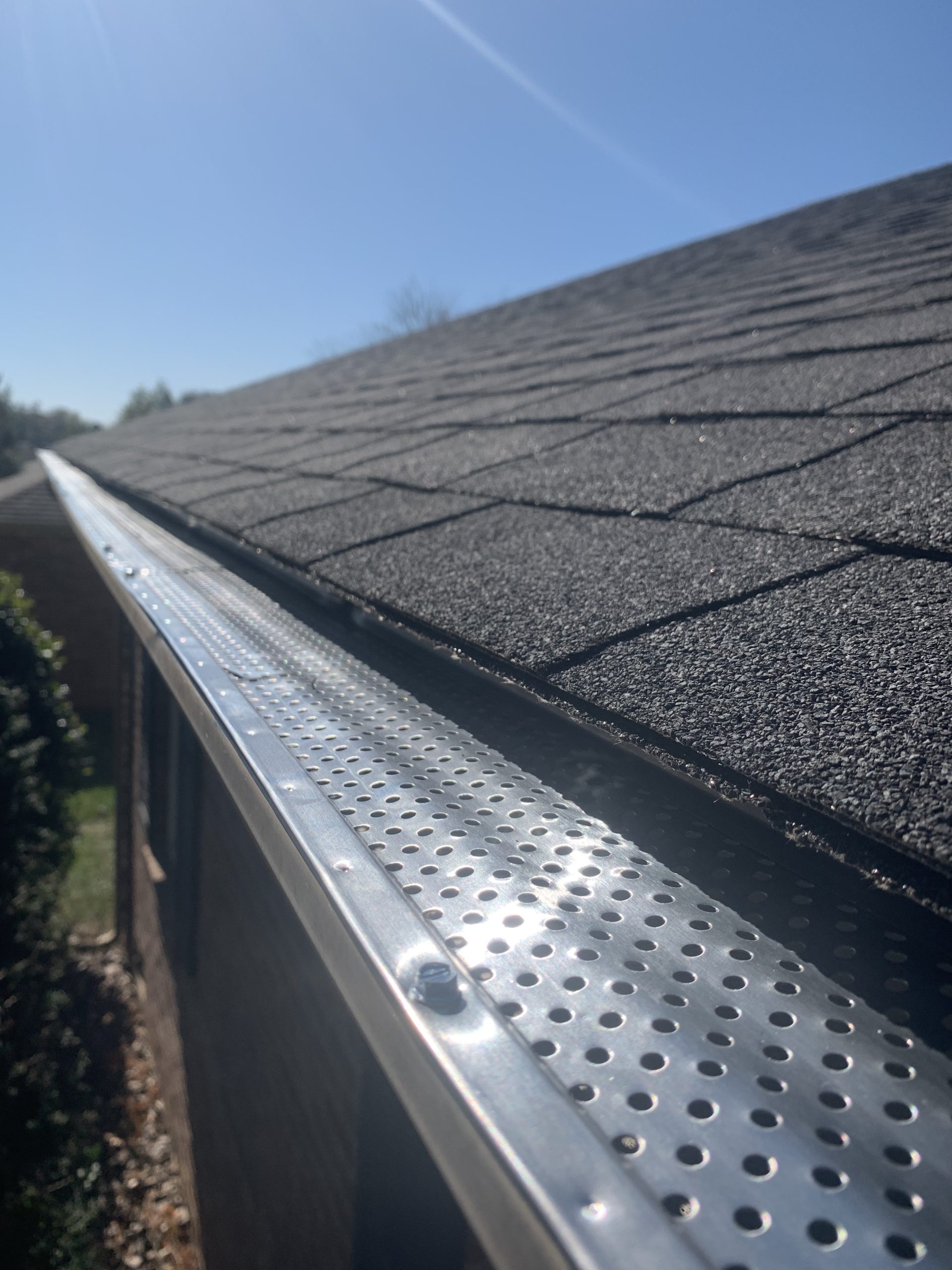 roof-of-a-house-showing-gutter-and-gutter-guard-pr-2024-11-27-05-54-44-utc